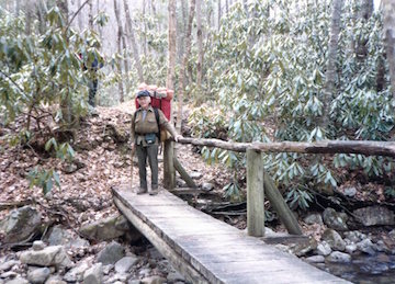 253.jpg--unknown on wooden bridge